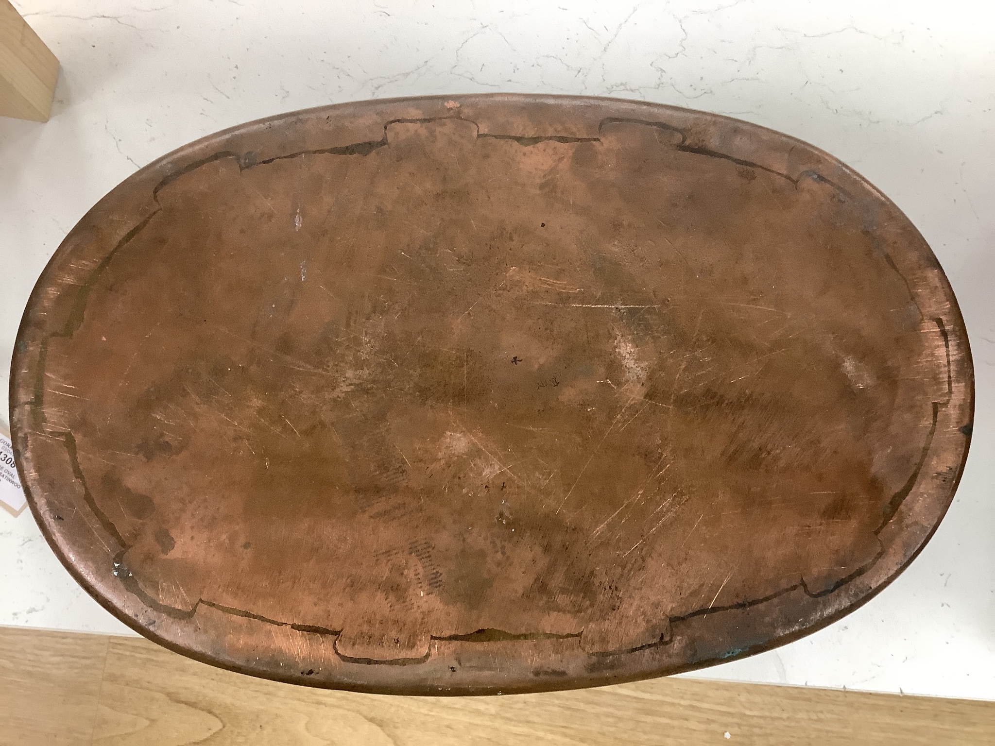A Benham & Froud oval copper pan. 54cm wide